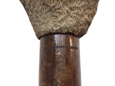 Lot 942 - Rare carved otter pole by Swaine & Adeney, London, the ash tree shaft terminating in a metal spike