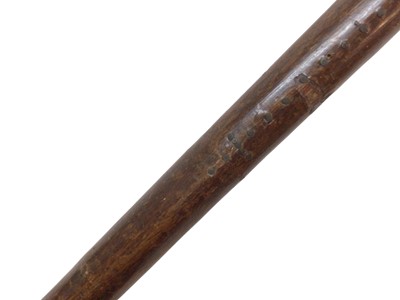 Lot 942 - Rare carved otter pole by Swaine & Adeney, London, the ash tree shaft terminating in a metal spike