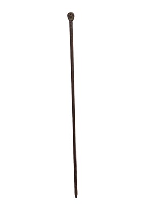 Lot 942 - Rare carved otter pole by Swaine & Adeney, London, the ash tree shaft terminating in a metal spike