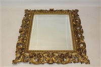 Lot 1439 - Large 19th century carved giltwood wall mirror,...