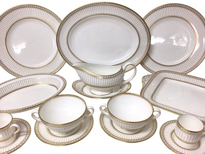 Lot 204 - Wedgwood Colonnade pattern six-eight place service for dinner and coffee, W4339 with gilded decoration, approximately 70 pieces.