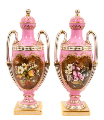 Lot 200 - Fine quality pair of Coalport porcelain vases and coves with finely handpainted polychrome flowers by Anthony Baggott