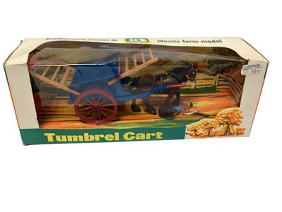 Lot 200 - Britains Trumbel Cart No.9567 (x2), Timber Trailer No.9559 & Animal Transporter No.9588, all in window boxes (4)