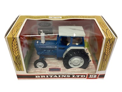 Lot 205 - Britains Ford 6600 blue & white livery Tractor, in window boxes No.9524 (3)