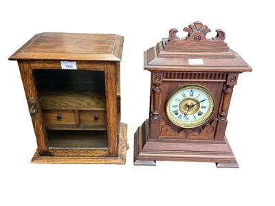 Lot 1202 - Edwardian oak smokers cabinet and an Edwardian mantel clock in architectural case (2)