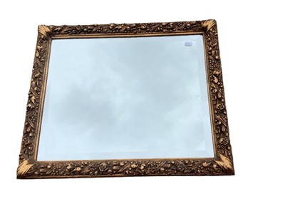 Lot 1242 - Gilt framed wall mirror in ornate frame, 53cm x 64cm