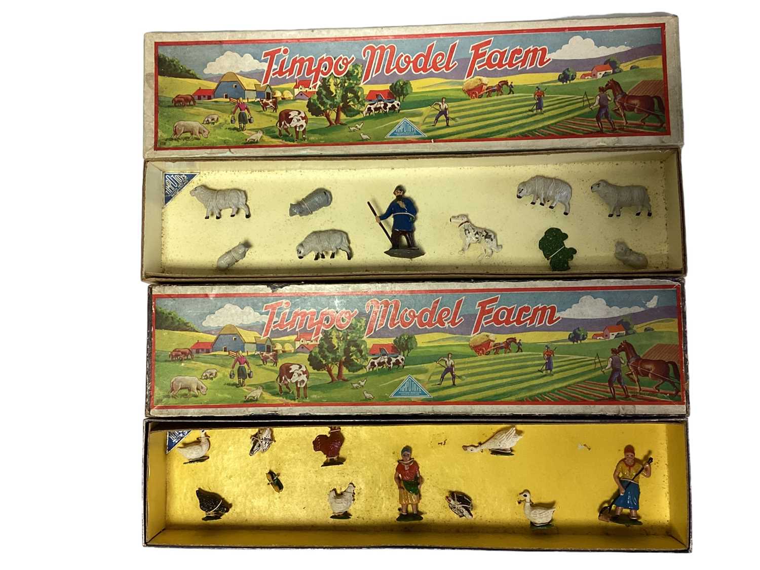 Lot 199 - Timpo Vintage Farm Series  box sets including Women Labourers with Poultry & Farmer with Sheep Dog & Sheep No.102, both boxed (2)