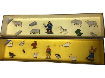 Lot 199 - Timpo Vintage Farm Series  box sets including Women Labourers with Poultry & Farmer with Sheep Dog & Sheep No.102, both boxed (2)