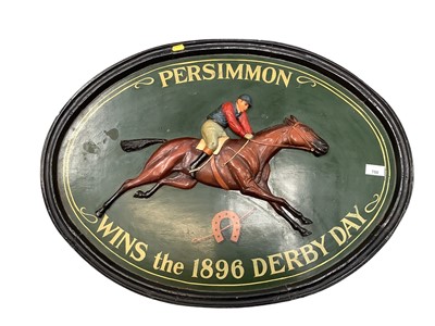 Lot 641 - Painted woooden oval plaque depicting a jockey on a racehorse 'Persimmon wins the 1896 Derby Day'