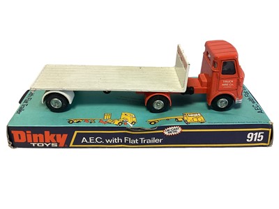 Lot 192 - Dinky diecast A.E.C. with Flat Trailer, on card plinth with bubblepack (Cracked & discoloured) No.915 (1)
