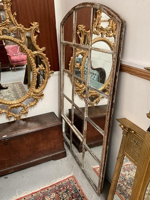 Lot 1265 - Large arched pair of mirrored doors, within metal framework, 163 x 116cm