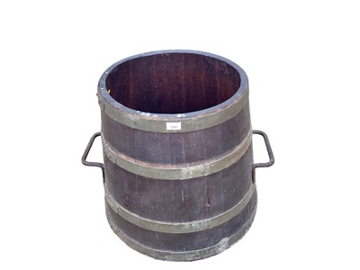 Lot 1297 - Brass bound wooden barrel of tapered form, 55cm high