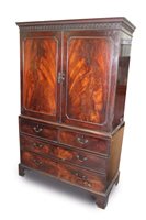 Lot 1463 - Good George III mahogany linen press, the...