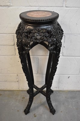 Lot 1443 - Late 19th century Chinese carved hardwood plant stand with marble inset top
