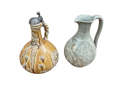 Lot 92 - Korean celadon glazed pottery ever and a German saltglazed pottery bellarmine jug (2)