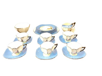 Lot 1139 - Art Deco Shelley tea set, Queen Anne shape, decorated with a cottage and pluming smoke, pattern 11604