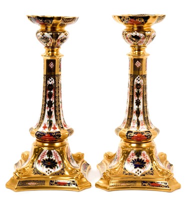 Lot 242 - Pair of Royal Crown Derby Imari candlesticks, pattern 1128, 26.5cm high