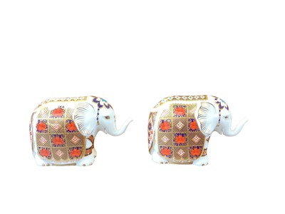 Lot 1133 - Pair of Royal Crown Derby Imari elephant paperweights, silver stoppers (seconds), 10cm high