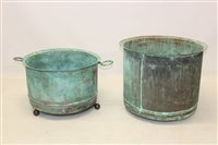 Lot 1474 - Two large copper vessels with everted rims,...