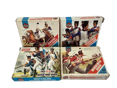 Lot 54 - Airfix OO Scale Waterloo soldiers (x4), Revell 1:72 Scale Cowboys & Indians (x3), German & US Infantry  & Imex Wagons (x2), all boxed (11total)