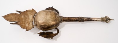 Lot 945 - Antiquei Tibetan ceremonial staff, with stylised skull ornament, 60cm long