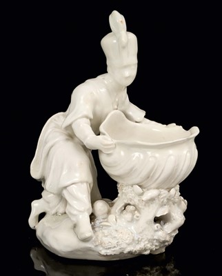 Lot 219 - Bow sweetmeat figure, in the white, of a man in Turkish costume, after a Meissen original, circa 1755