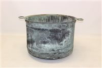 Lot 1479 - Massive riveted copper vessel with everted rim...