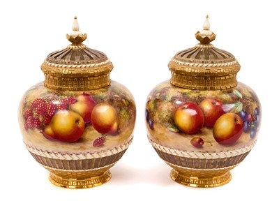 Lot 211 - Pair of Royal Worcester pot pourri vases, covers and inner covers, painted by Freeman