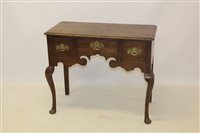 Lot 1485 - Mid-18th century oak lowboy with moulded top...