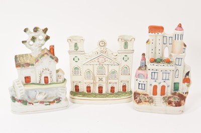 Lot 87 - 19th century Staffordshire castle shaped spill vase, and two other similar pieces