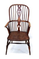 Lot 1489 - Early 19th century ash and elm windsor elbow...