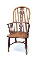 Lot 1490 - Early 19th century ash and elm windsor elbow...