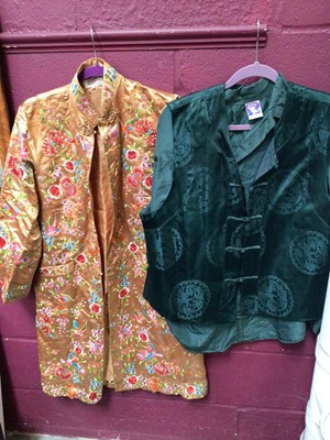 Lot 305 - Two large suitcases containing mostly vintage and contemporary Chinese embroidered robes, jackets etc