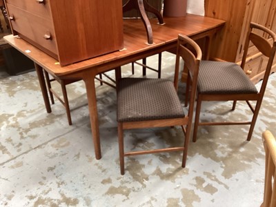 Lot 1311 - 1960s teak extending dining table and set of four chairs