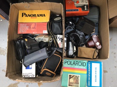 Lot 324 - Two boxes of vintage cameras, binoculars and accessories