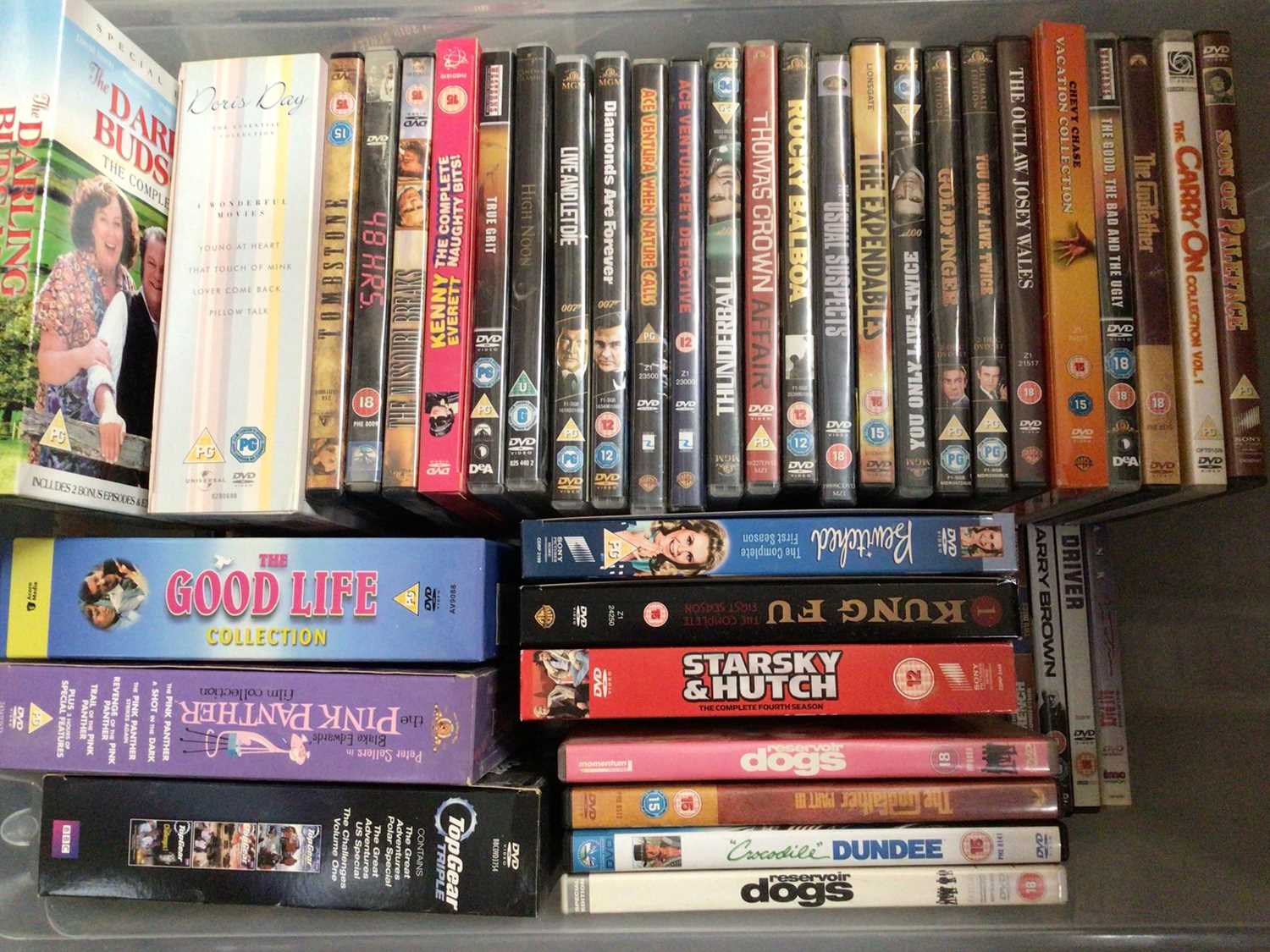 Lot 306 - Four boxes of DVDs including series boxed