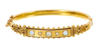Lot 488 - Late Victorian 15ct gold opal and diamond hinged bangle