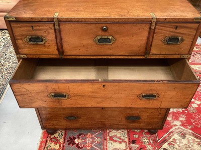 Lot 1409 - Victorian mahogany and brass bound secretaire campaign chest, in two parts