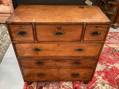 Lot 1409 - Victorian mahogany and brass bound secretaire campaign chest, in two parts