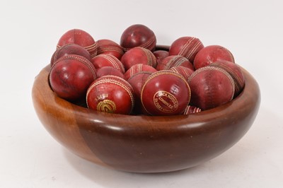 Lot 964 - Wooden bowl housing 35 vintage cricket balls