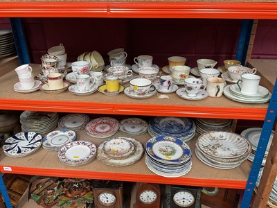 Lot 686 - Two shelves of assorted teaware and plates together with various collectors plates