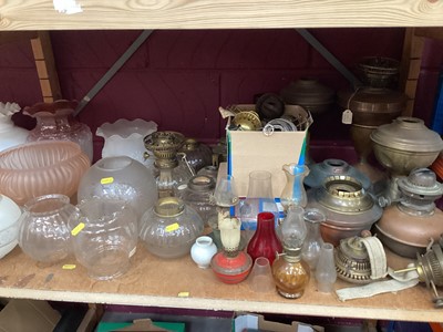 Lot 679 - Collection of oil lamp parts, shades, burners etc