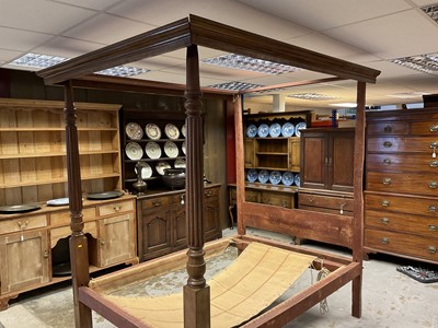 Lot 1287 - 19th century mahogany four poster bed, supported by two front reeded columns, 143cm wide x 212cm high