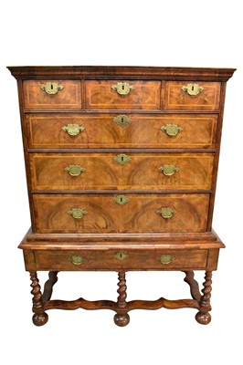 Lot 1421 - Early 18th century walnut feather banded chest on stand