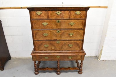 Lot 1421 - Early 18th century walnut feather banded chest on stand