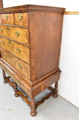 Lot 1421 - Early 18th century walnut feather banded chest on stand