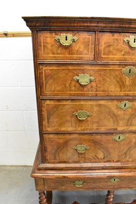 Lot 1421 - Early 18th century walnut feather banded chest on stand