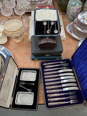 Lot 409 - Part set of silver bean end coffee spoons, silver handled desert cutlery, pair of cut glass pickle dishes with silver forks and group of plated flatware.