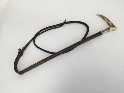 Lot 949 - Swaine silver mounted hunting whip with horn handle and plaited leather shaft, together with another Swaine & Adeney bamboo hunting whip (2)