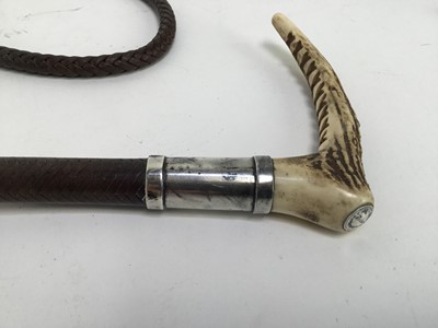 Lot 949 - Swaine silver mounted hunting whip with horn handle and plaited leather shaft, together with another Swaine & Adeney bamboo hunting whip (2)